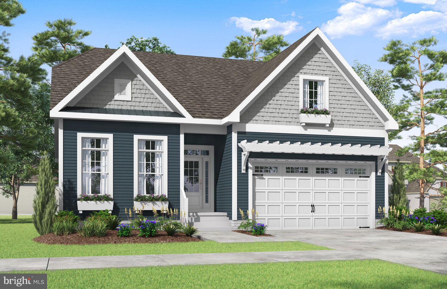 a view of a house with yard and plants