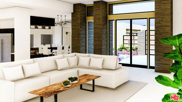 32 Granite Ridge Road Rancho Mirage, CA 92270 - Photo 4 of 11 a living room with furniture fireplace and flat screen tv