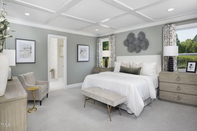 a bedroom with a bed and chair