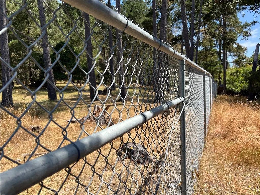 0 Warren Road Cambria, CA 93428 - Photo 14 of 29 a view of balcony with wooden floor and fence