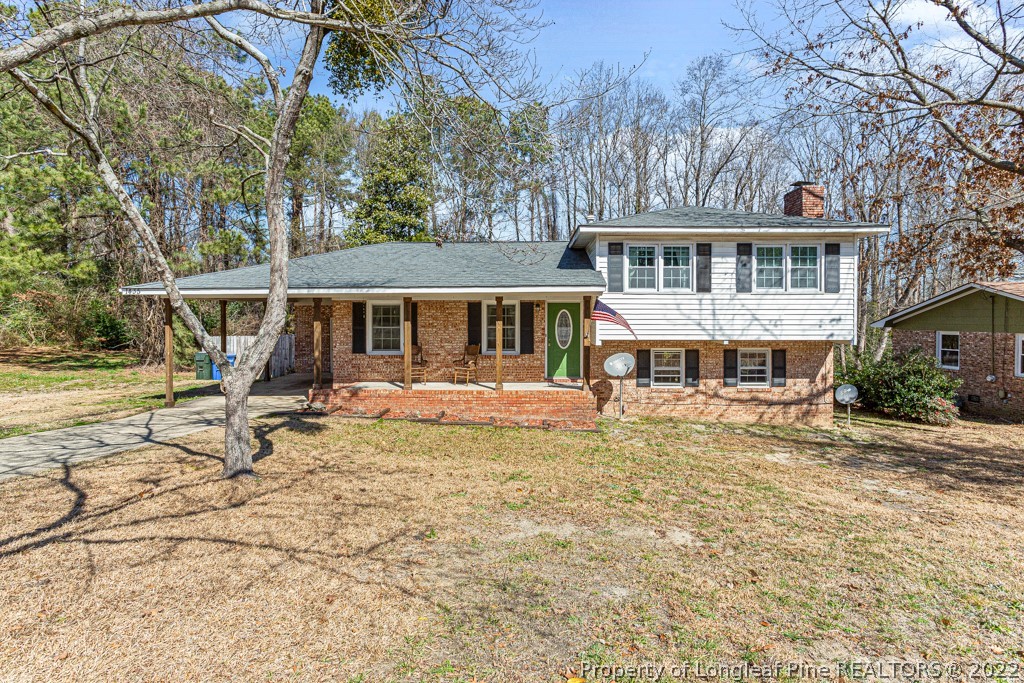 1435 Marlborough Road Fayetteville, NC 28304 - Photo 1 of 35 a front view of a house with a patio