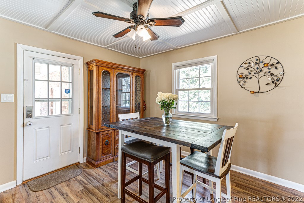 1435 Marlborough Road Fayetteville, NC 28304 - Photo 12 of 35 a view of a dining room with furniture window and wooden floor