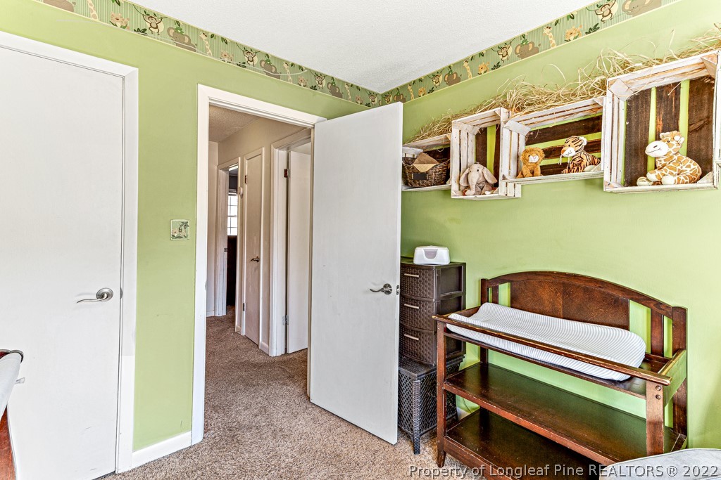 1435 Marlborough Road Fayetteville, NC 28304 - Photo 19 of 35 a room with furniture and a window