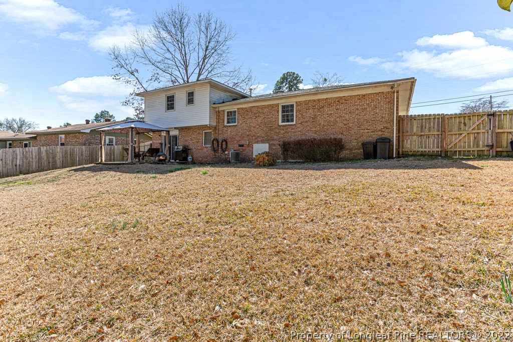 1435 Marlborough Road Fayetteville, NC 28304 - Photo 34 of 35 a front view of a house with a yard
