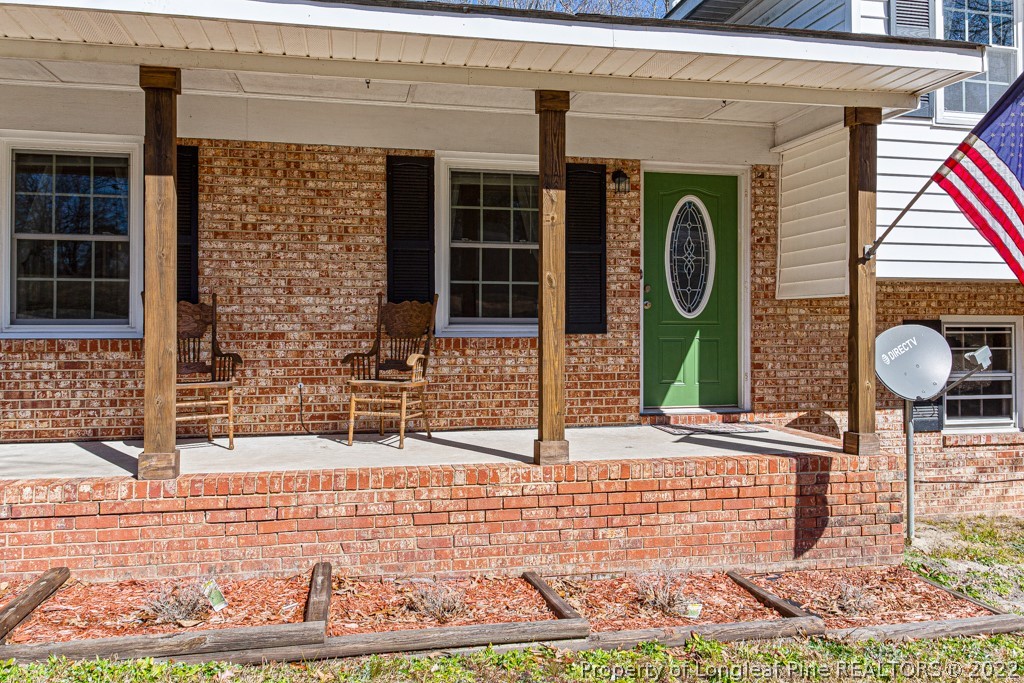 1435 Marlborough Road Fayetteville, NC 28304 - Photo 4 of 35 a front view of a house with garden
