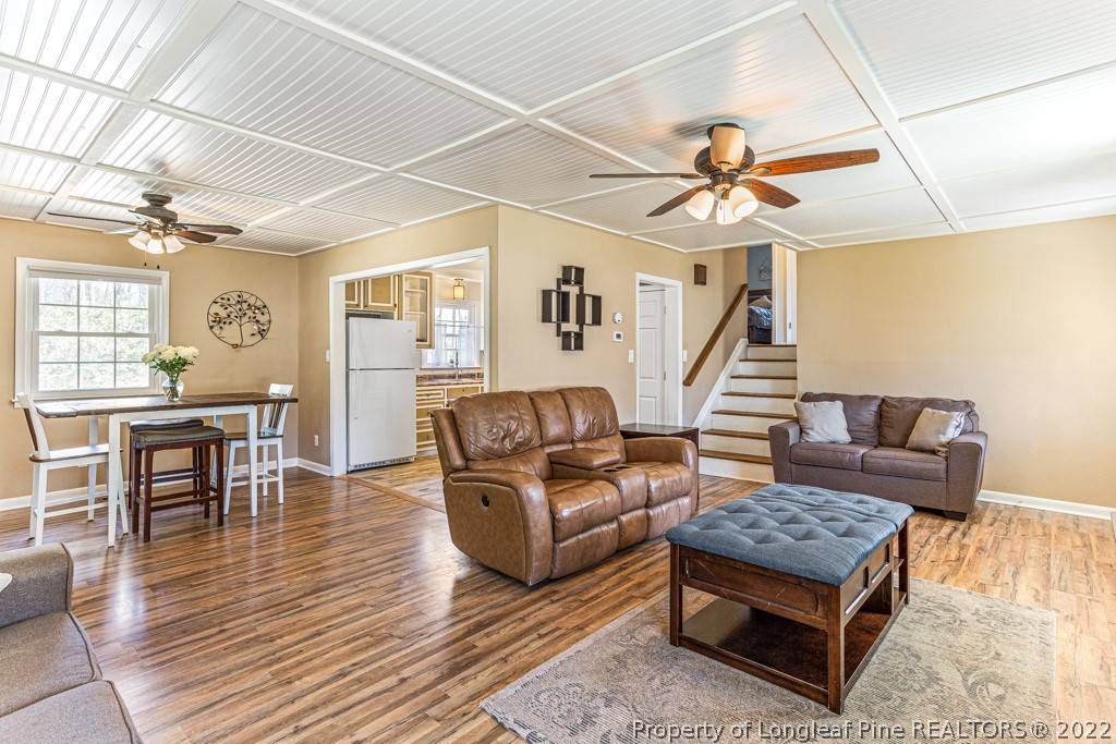 1435 Marlborough Road Fayetteville, NC 28304 - Photo 10 of 35 a living room with furniture and wooden floor
