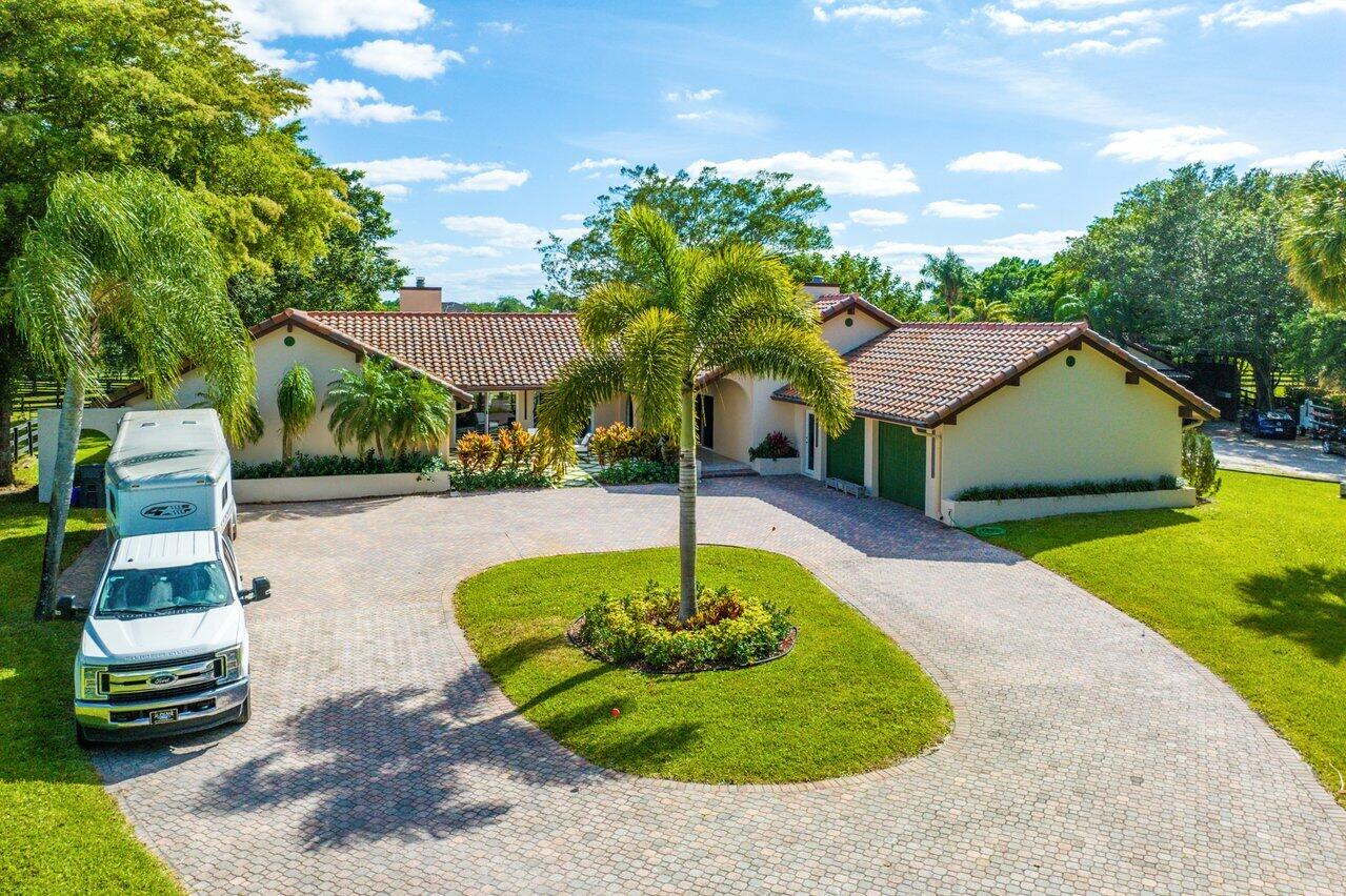 14380 Wither Close Wellington, FL 33414 - Photo 23 of 28 Front Exterior