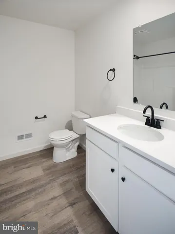 a bathroom with a sink and a toilet