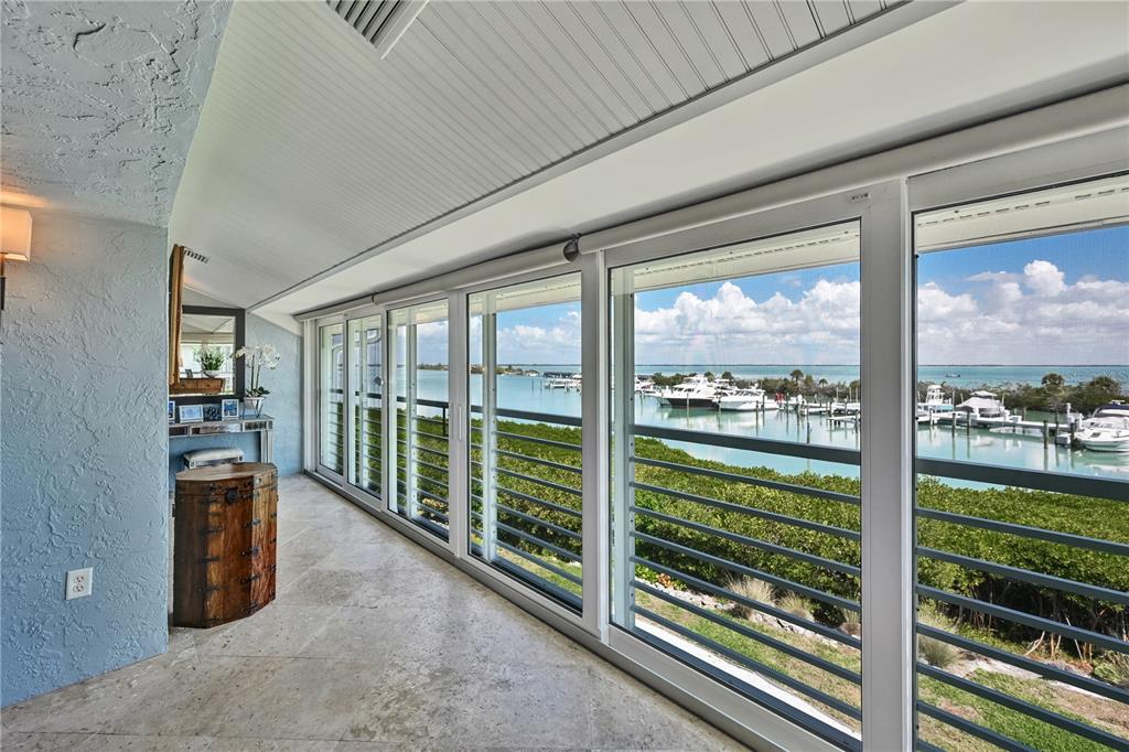 5854 Gasparilla Road, Unit M22 Boca Grande, FL 33921 - Photo 34 of 54 a view of a room with a large window