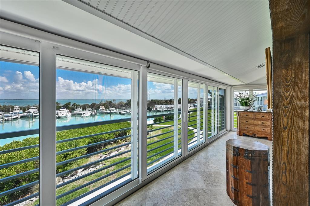 5854 Gasparilla Road, Unit M22 Boca Grande, FL 33921 - Photo 35 of 54 a view of a city from a balcony