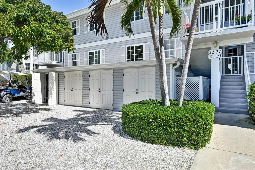 5854 Gasparilla Road, Unit M22 Boca Grande, FL 33921 - Photo 38 of 54 a view of a house with a garden