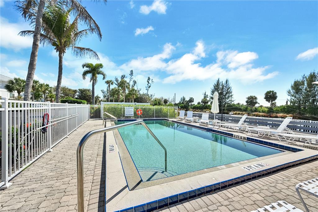 5854 Gasparilla Road, Unit M22 Boca Grande, FL 33921 - Photo 41 of 54 swimming pool view from a balcony