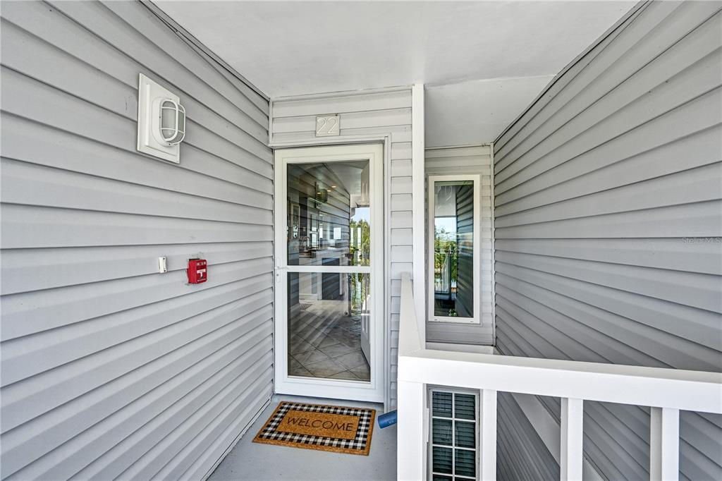 5854 Gasparilla Road, Unit M22 Boca Grande, FL 33921 - Photo 5 of 54 a view of a door and a window