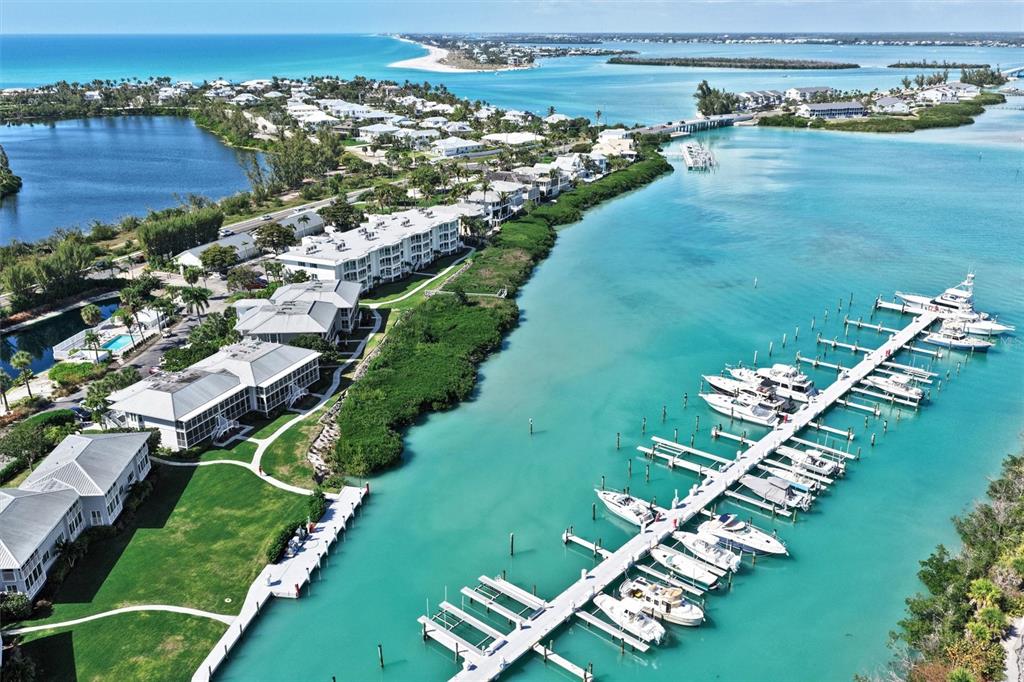 5854 Gasparilla Road, Unit M22 Boca Grande, FL 33921 - Photo 53 of 54 an aerial view of a house with a garden lake view