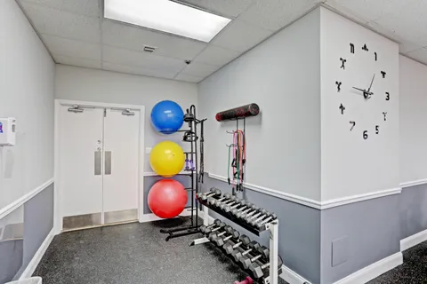 a view of a room with gym equipment