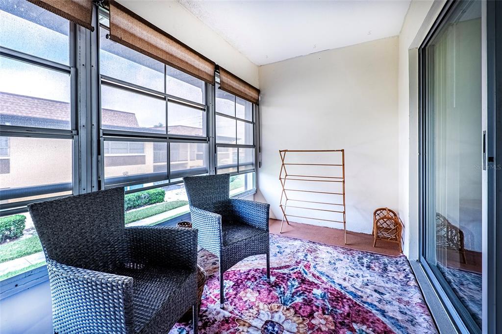 5197 Silent Loop, Unit 224 New Port Richey, FL 34652 - Photo 32 of 41 a living room with furniture and a window