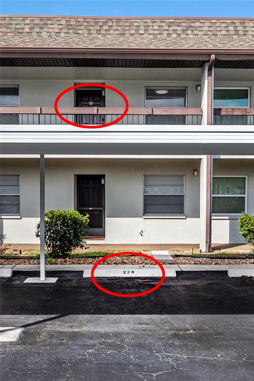 5197 Silent Loop, Unit 224 New Port Richey, FL 34652 - Photo 34 of 41 a front view of a house with retail shops