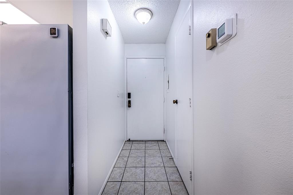 5197 Silent Loop, Unit 224 New Port Richey, FL 34652 - Photo 5 of 41 a view of a hallway