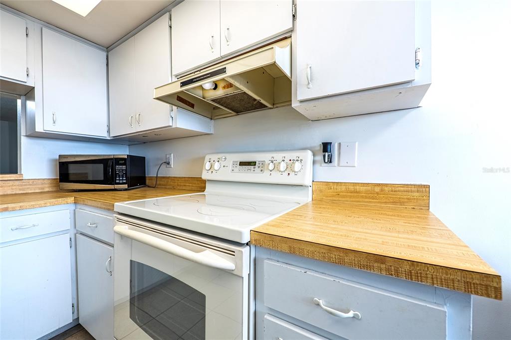 5197 Silent Loop, Unit 224 New Port Richey, FL 34652 - Photo 10 of 41 a utility room with dryer and washer