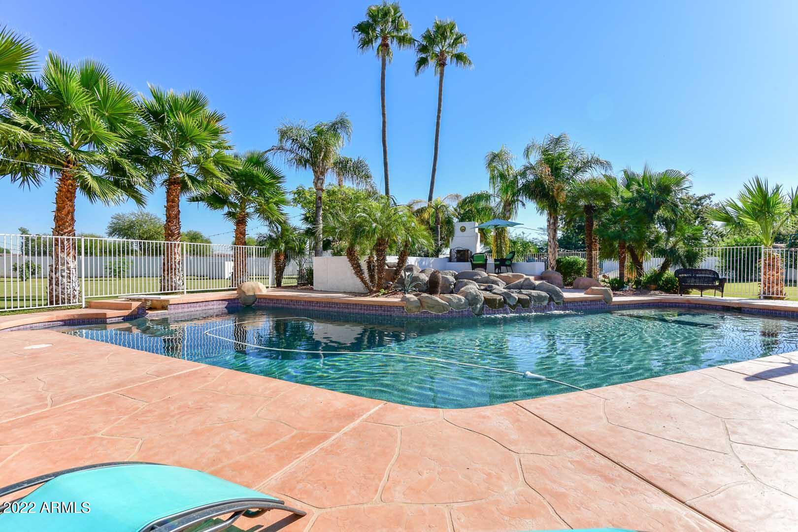 5237 North 106th Avenue Glendale, AZ 85307 - Photo 2 of 75 a view of a swimming pool with a patio
