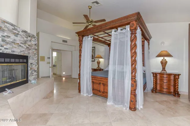 a spacious bathroom with a granite countertop sink mirror bathtub and shower