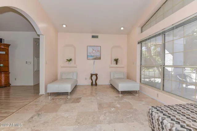 a room with furniture and a flat screen tv