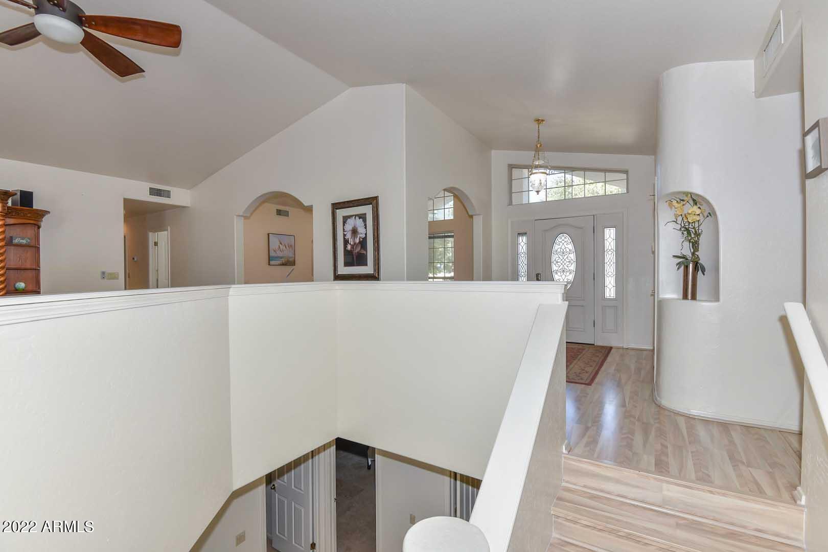 5237 North 106th Avenue Glendale, AZ 85307 - Photo 38 of 75 a view of a living room with furniture and wooden floor