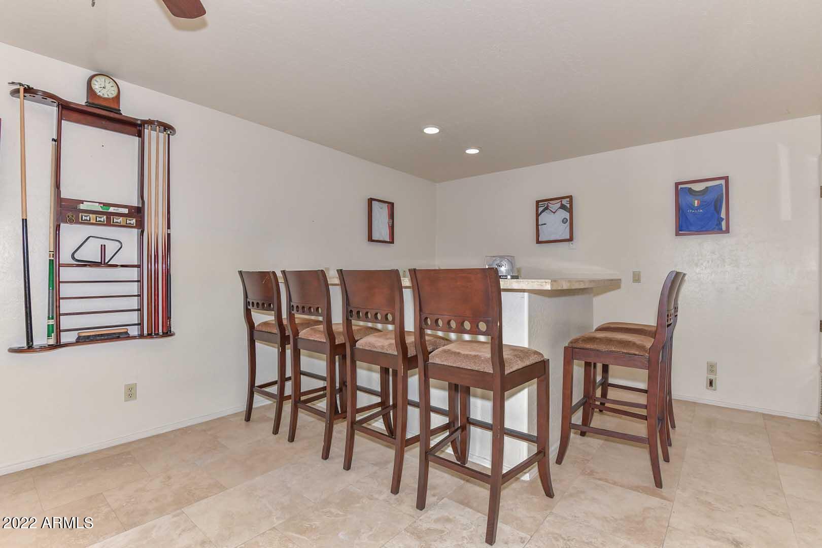 5237 North 106th Avenue Glendale, AZ 85307 - Photo 47 of 75 a view of a dining room with furniture