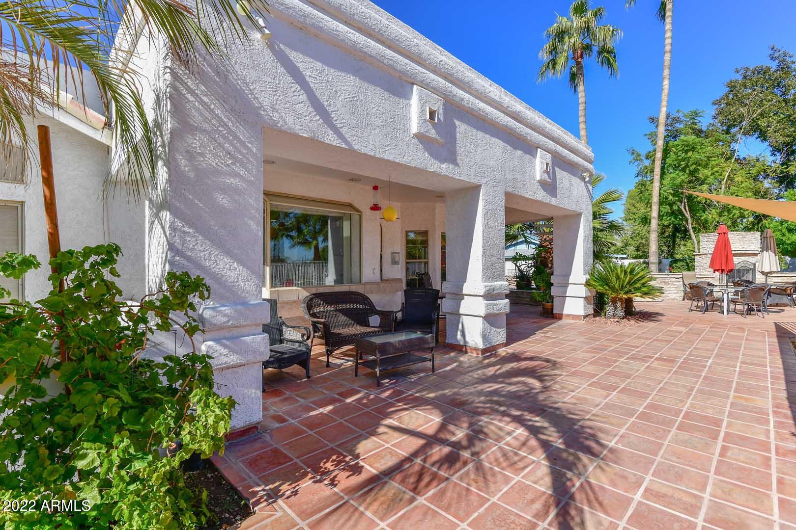 5237 North 106th Avenue Glendale, AZ 85307 - Photo 57 of 75 a building exterior with furniture