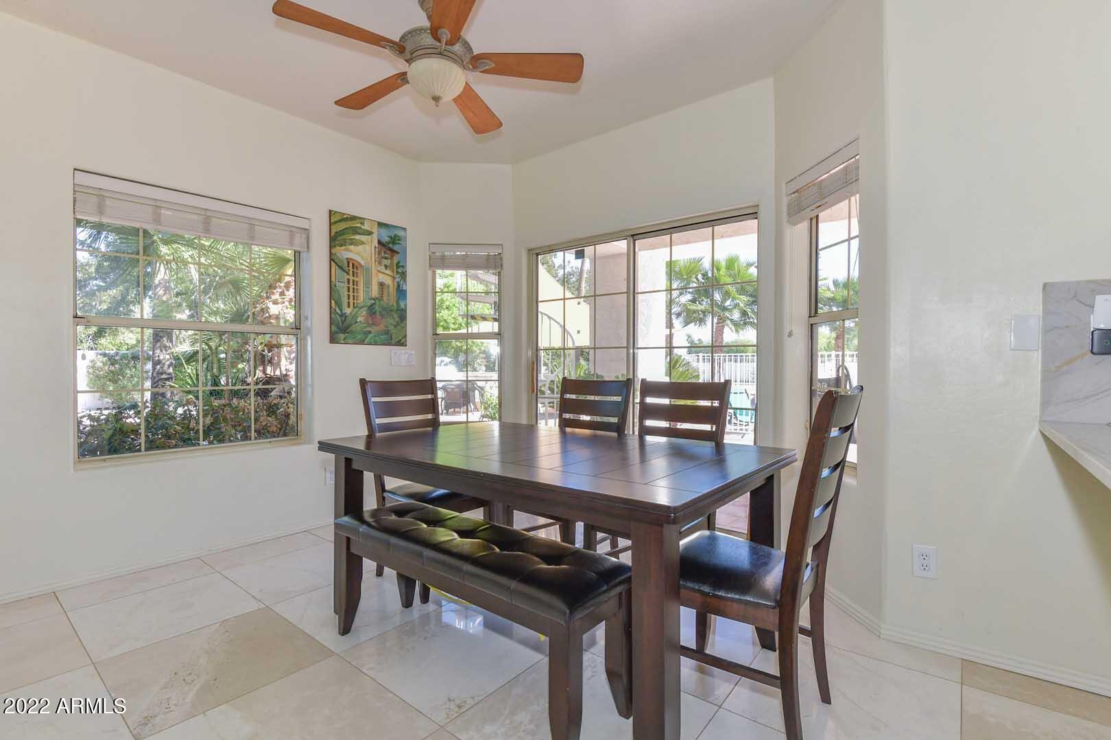 5237 North 106th Avenue Glendale, AZ 85307 - Photo 9 of 75 a view of a dining room with furniture window and outside view