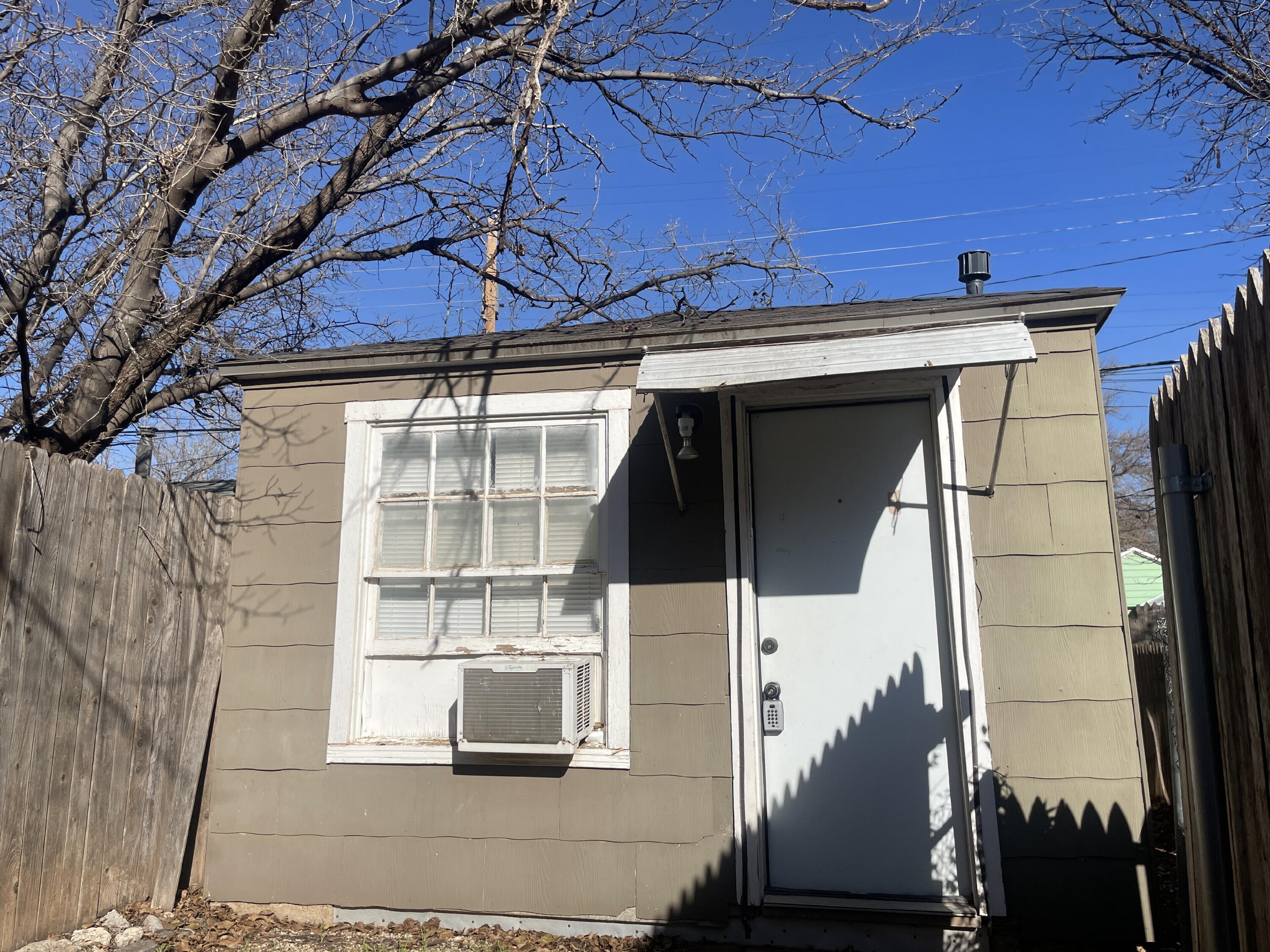 2520 27th Street, Unit REAR HOUSE Lubbock, TX 79410 - Photo 1 of 21 a view of a door of the house