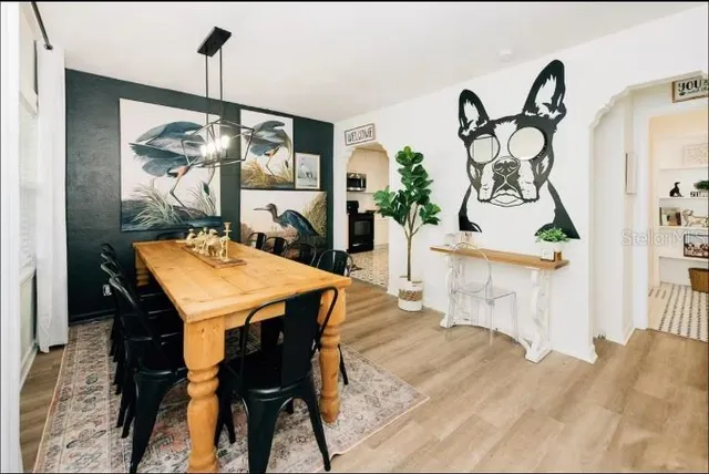 a vase of flowers sitting on a table