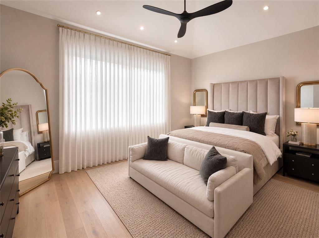 320 O Connor Ridge Boulevard, Unit 22 Irving, TX 75038 - Photo 20 of 34 a bedroom with a large bed couch and window