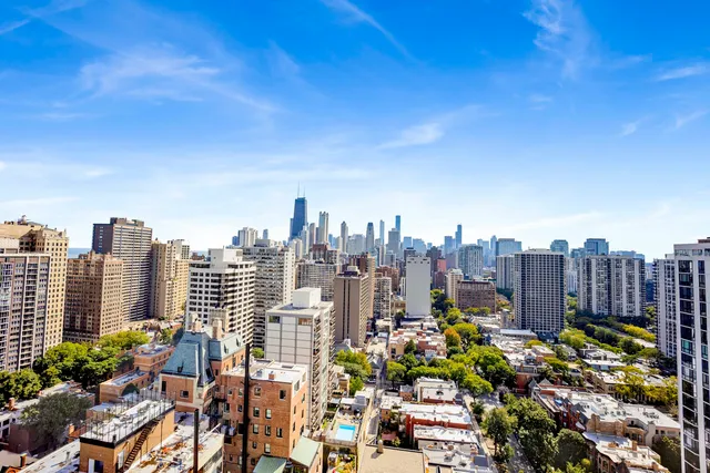 a view of a city with tall buildings
