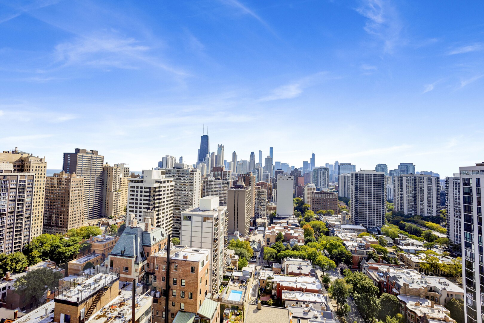 1555 North Dearborn Parkway, Unit 8C Chicago, IL 60610 - Photo 13 of 20 a view of a city with tall buildings