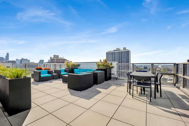 a view of a terrace with furniture