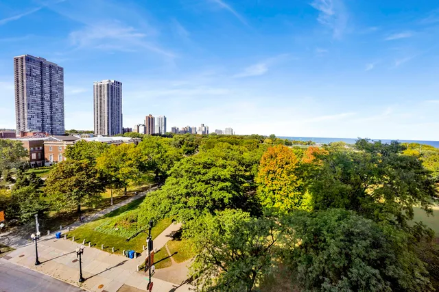 a view of a city with tall buildings in the background