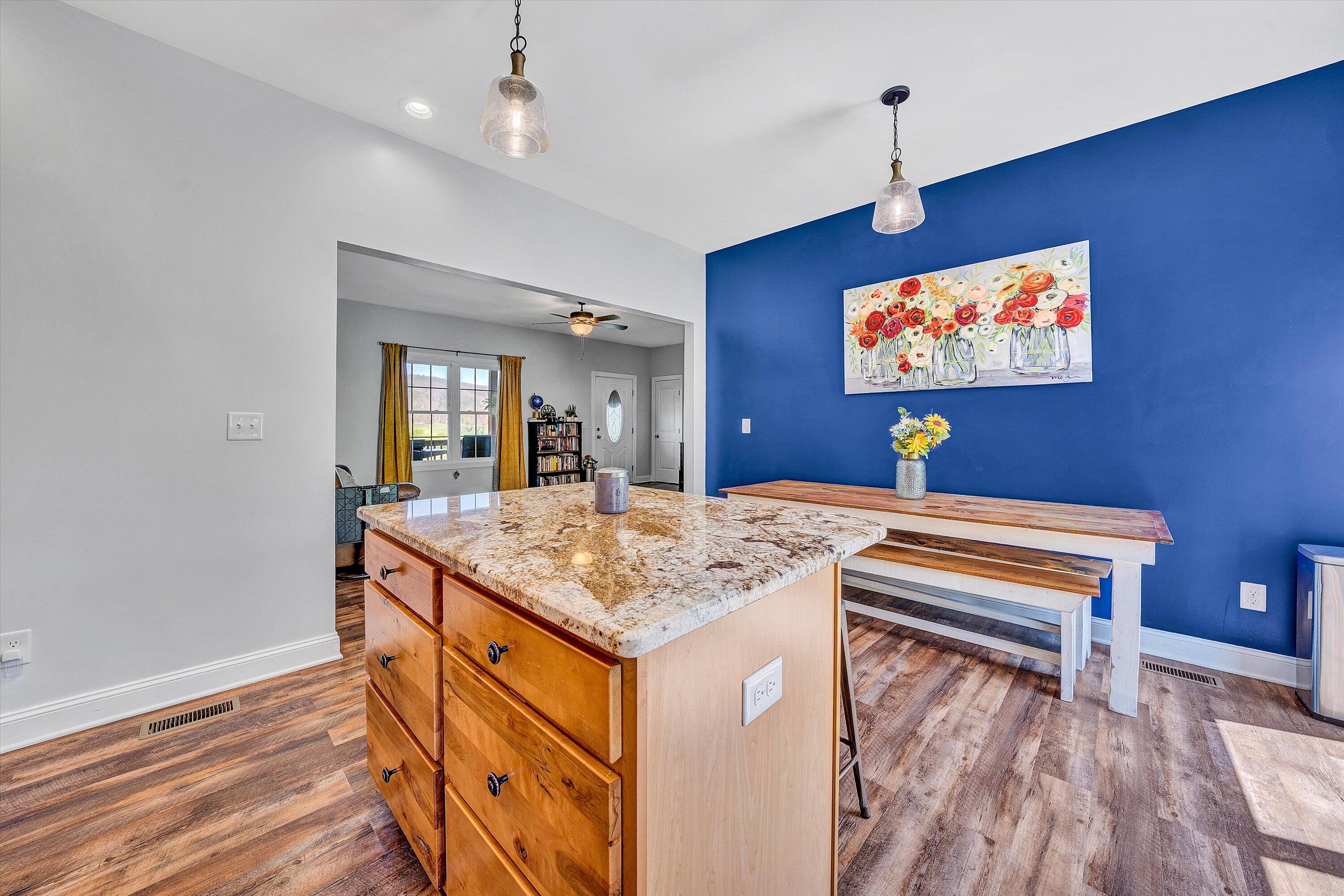 8350 Newport Road Catawba, VA 24070 - Photo 12 of 75 a view of kitchen island with wooden floor