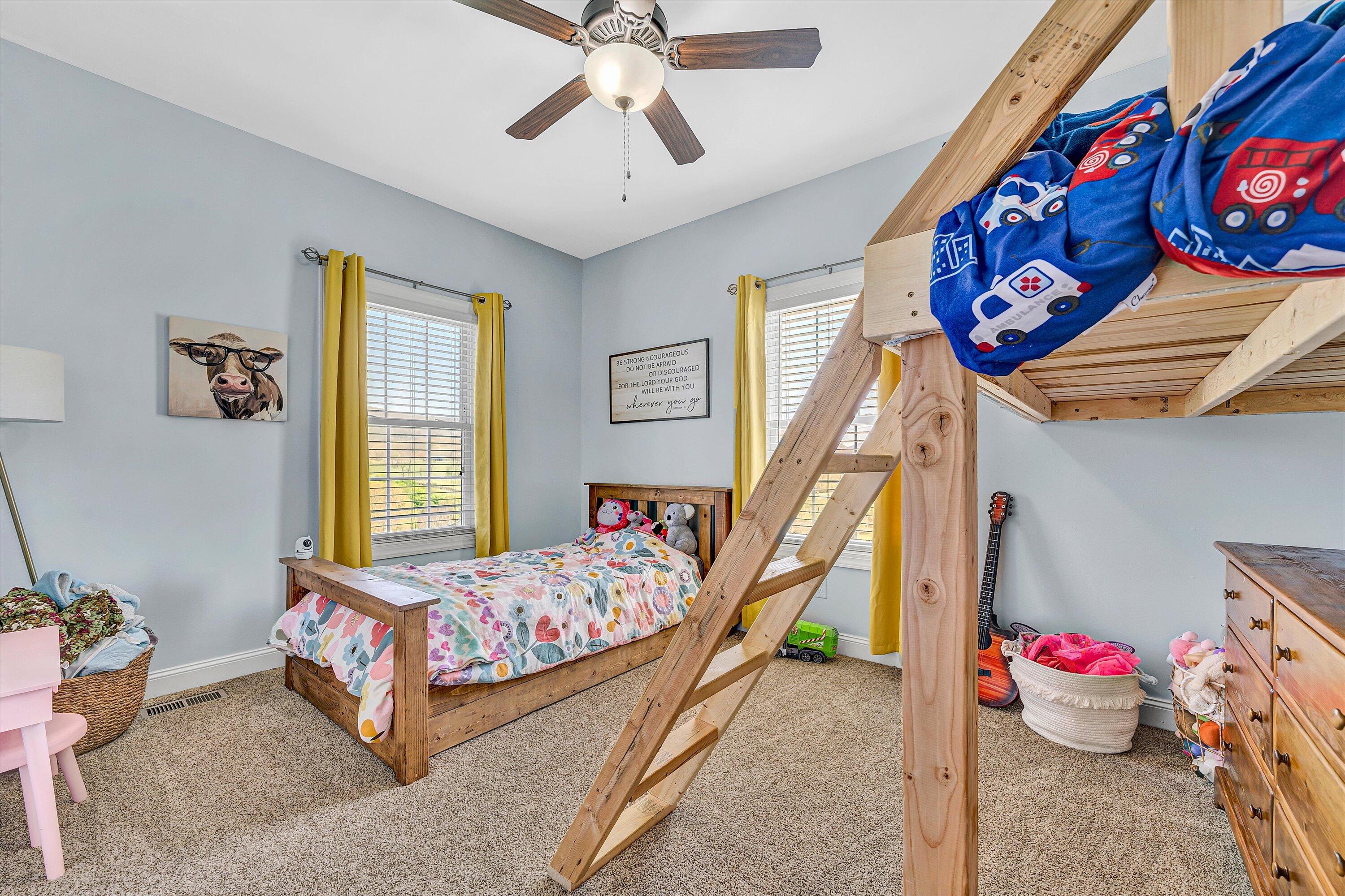 8350 Newport Road Catawba, VA 24070 - Photo 30 of 75 a bedroom with a bed and window