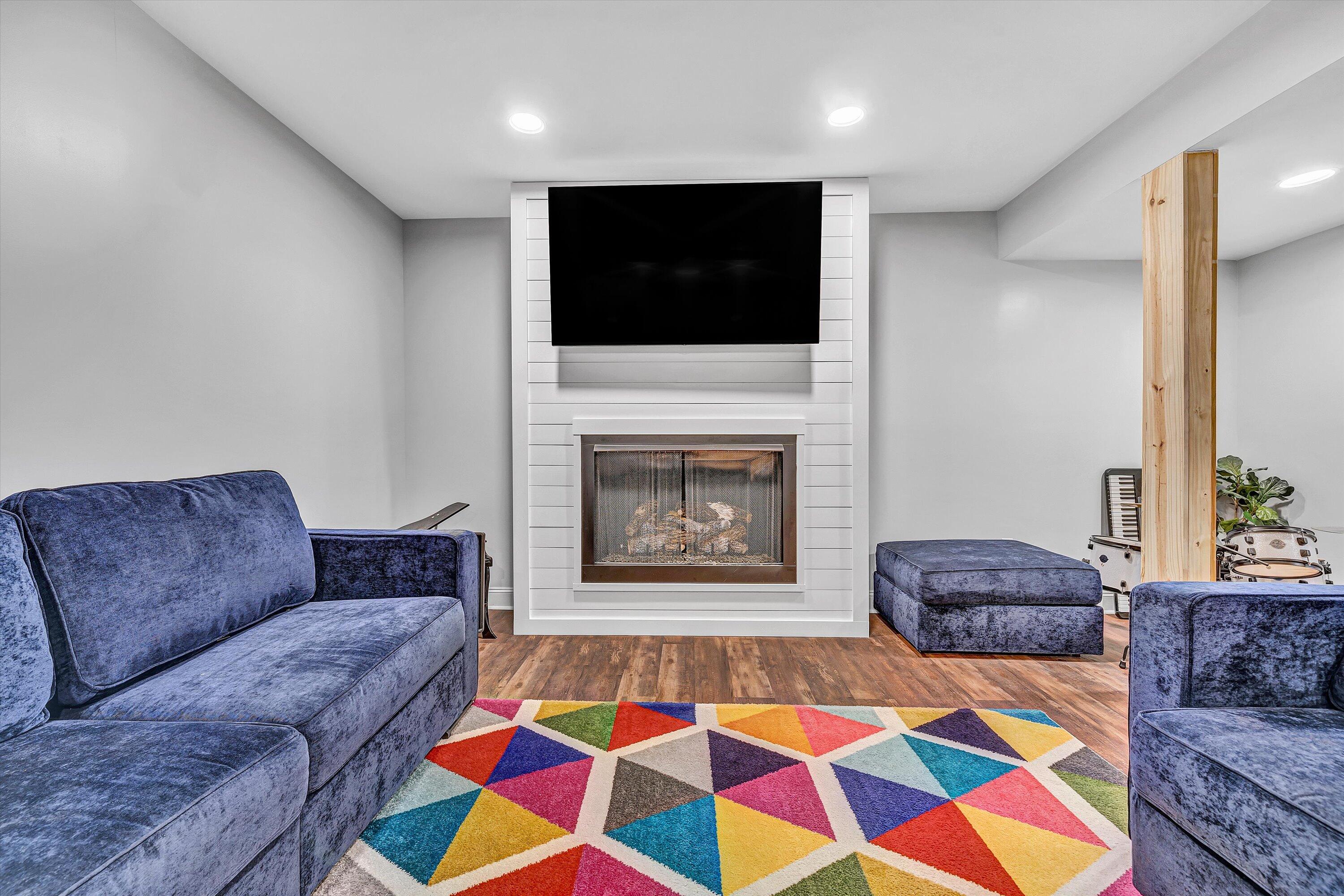 8350 Newport Road Catawba, VA 24070 - Photo 34 of 75 a living room with a couch and a fireplace