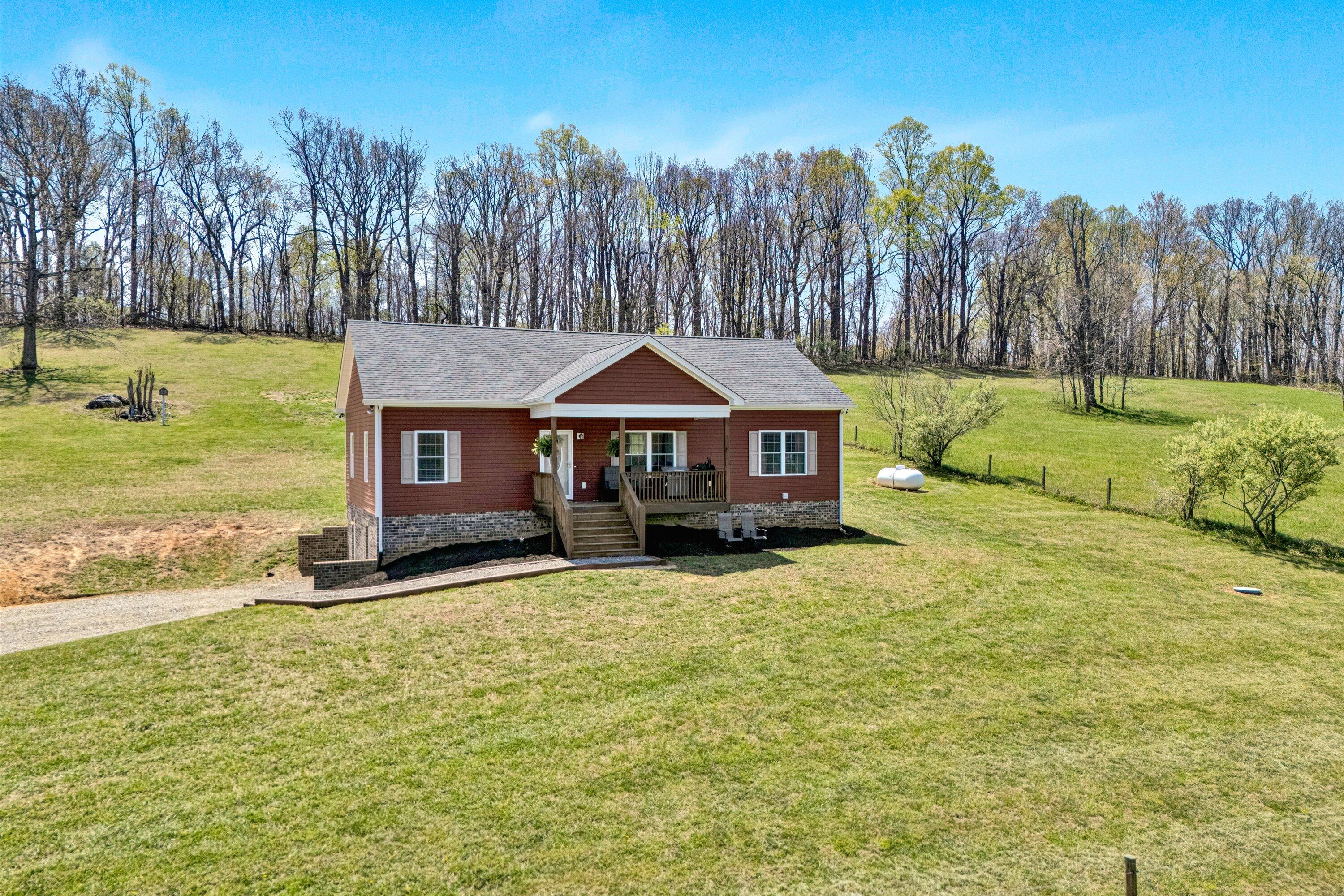 8350 Newport Road Catawba, VA 24070 - Photo 48 of 75 a front view of a house with a yard