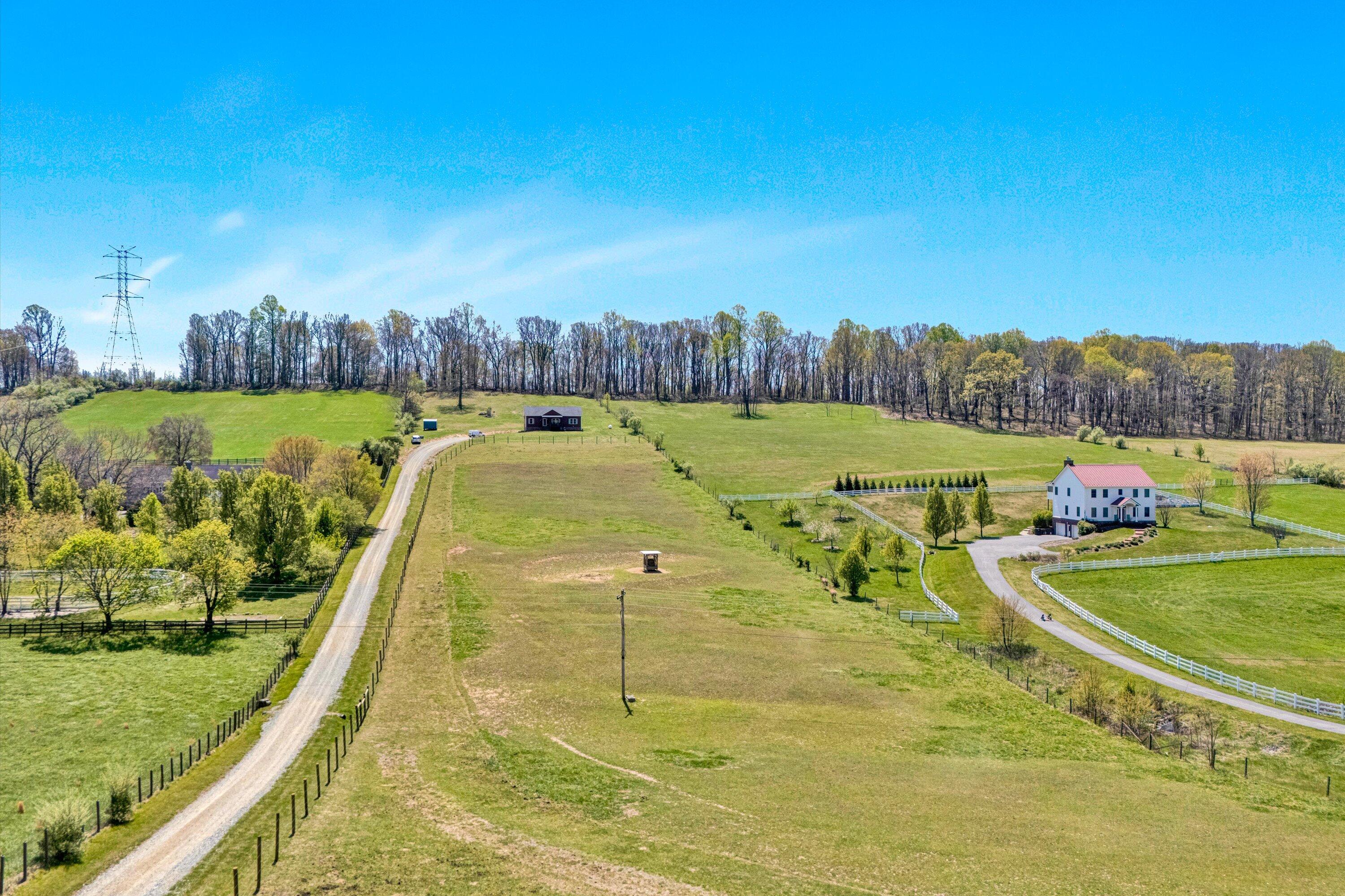 8350 Newport Road Catawba, VA 24070 - Photo 56 of 75 a view of a swimming pool with an outdoor seating and a garden