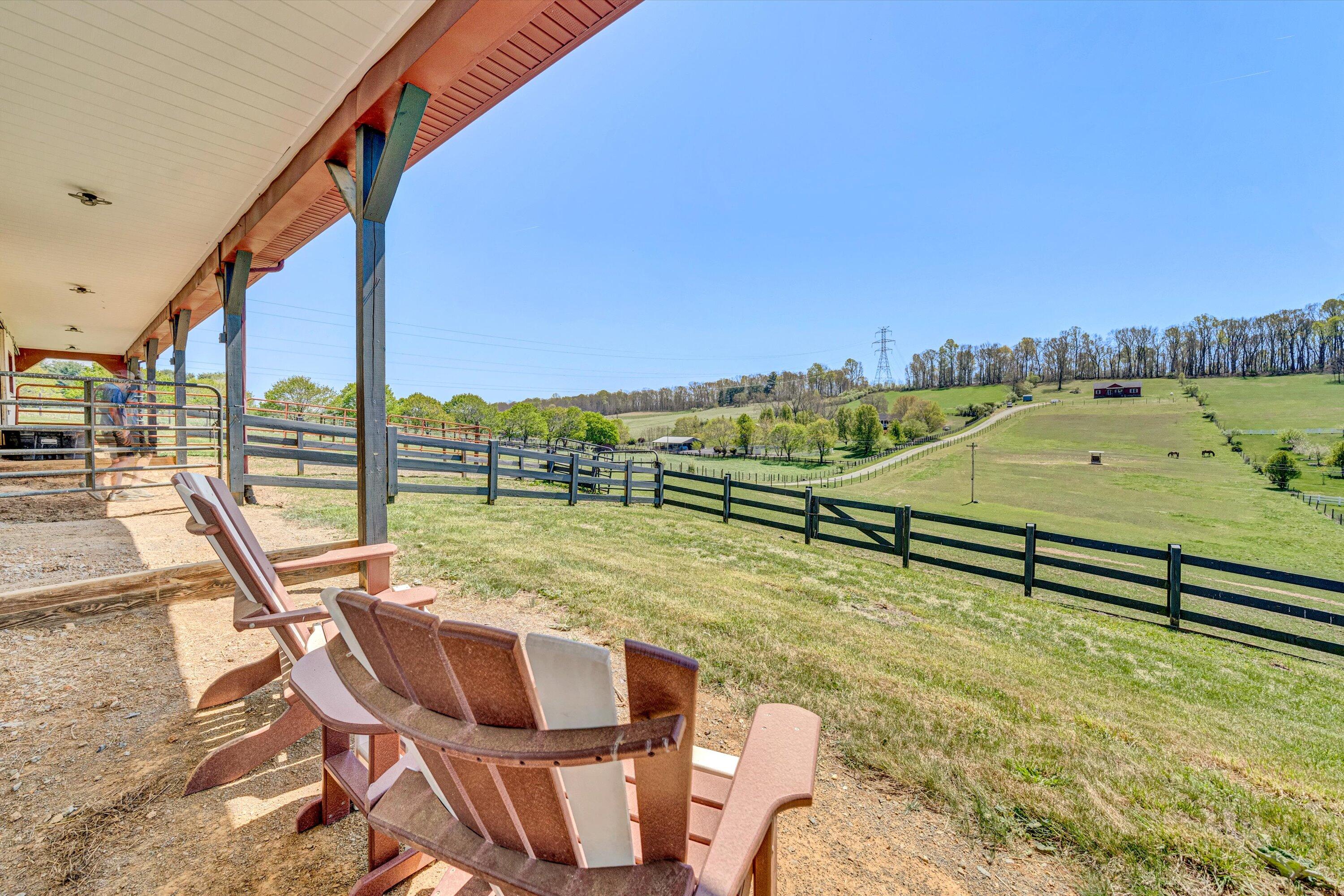 8350 Newport Road Catawba, VA 24070 - Photo 62 of 75 a view of a swimming pool with a lounge chairs