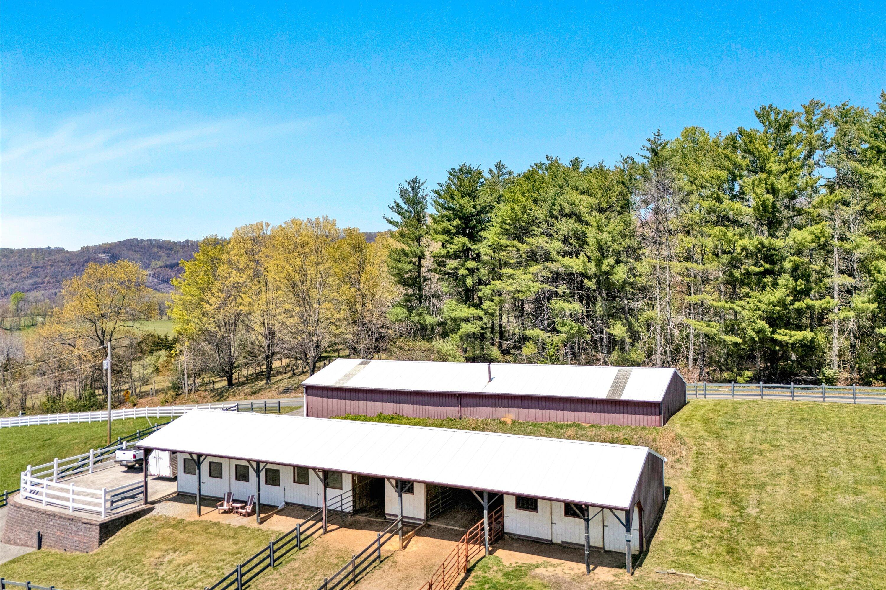 8350 Newport Road Catawba, VA 24070 - Photo 68 of 75 a view of a swimming pool with an outdoor seating and a garden