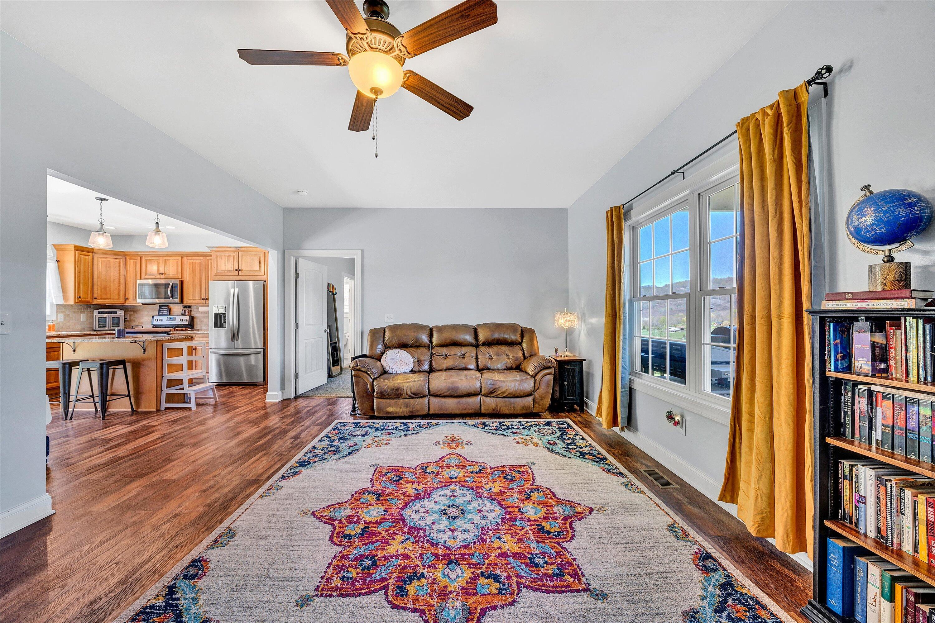 8350 Newport Road Catawba, VA 24070 - Photo 7 of 75 a living room with furniture and a book shelf