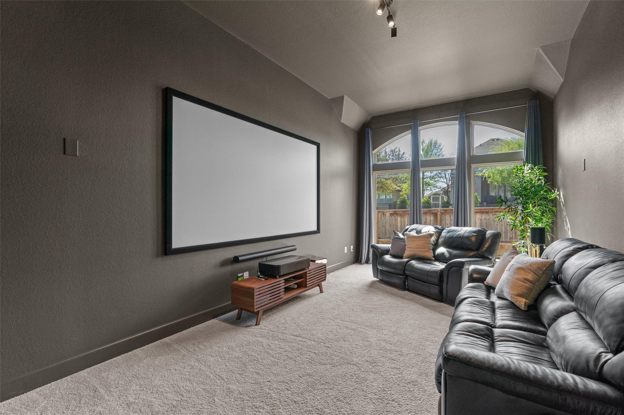 101 Pienza Drive Georgetown, TX 78628 - Photo 5 of 40 a living room with furniture and a flat screen tv