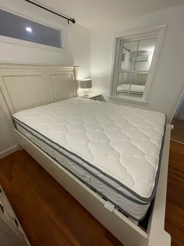 a bathroom with a sink a toilet and vanity