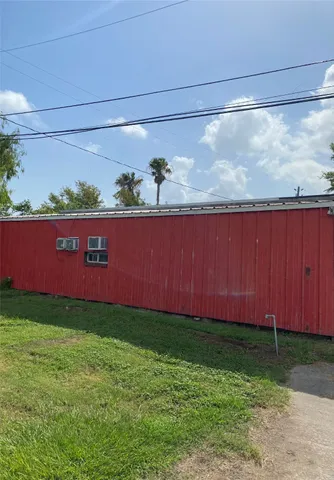 a view of a yard with an outdoor space