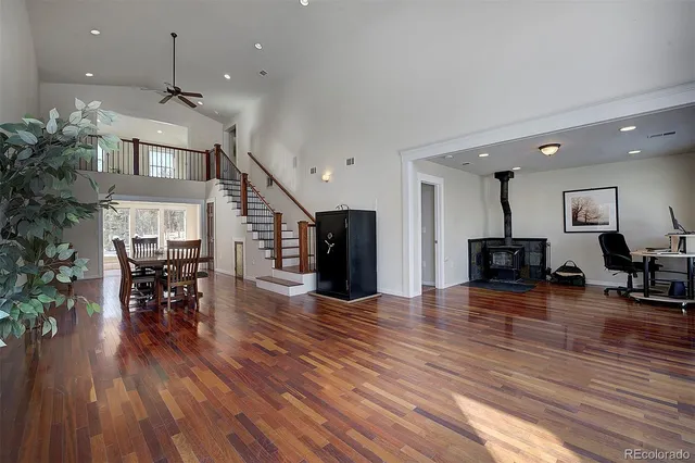 a view of dining room with furniture and wooden floor