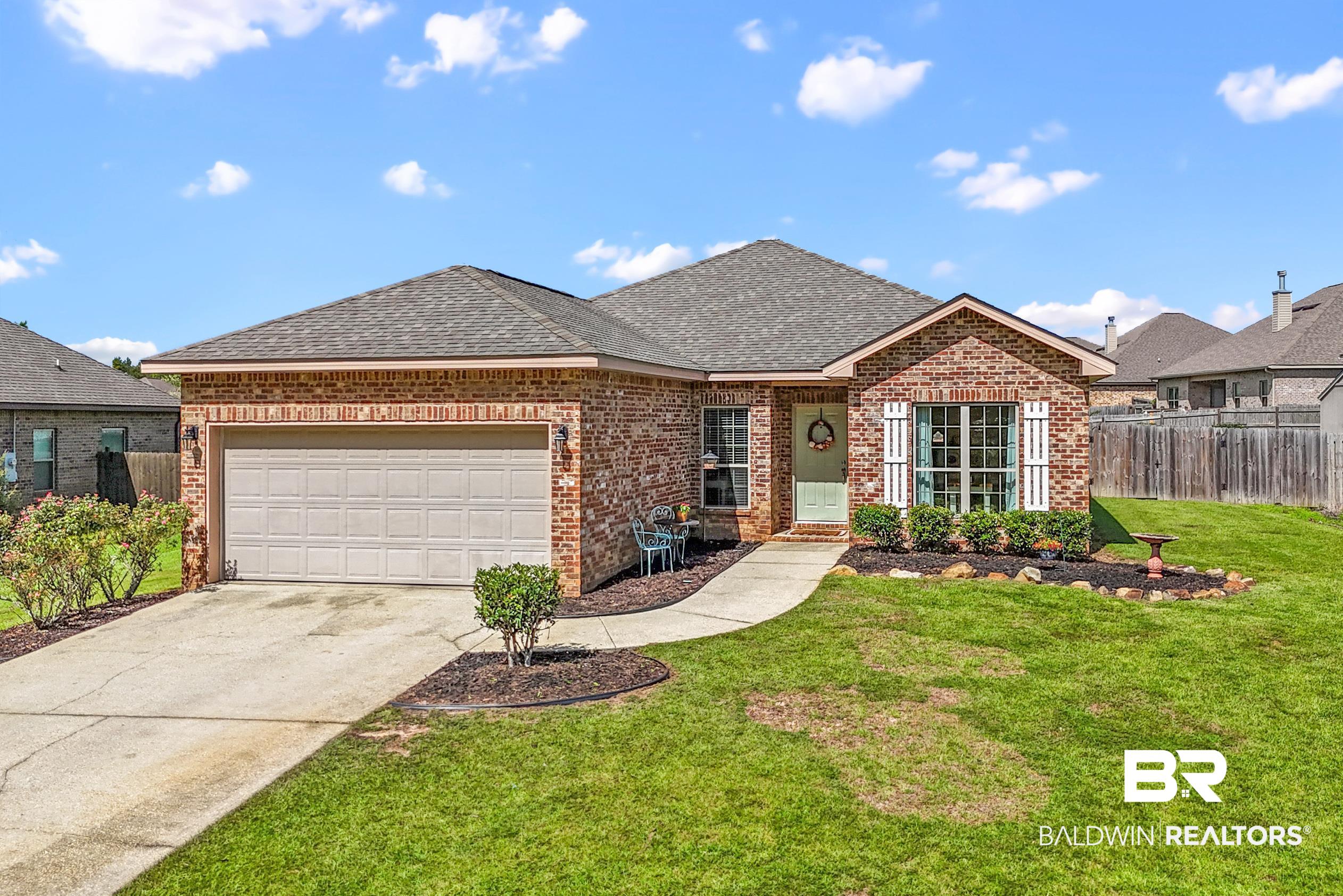 745 Bonaventure Street Fairhope, AL 36532 - Photo 29 of 36 Ranch-style home with a garage and a front lawn